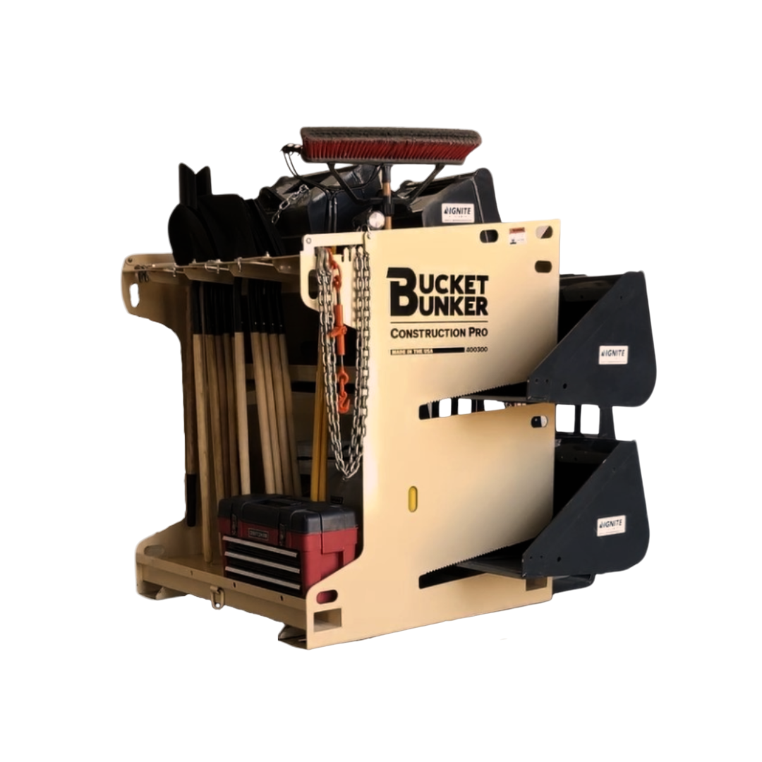 Loaded Construction PRO attachment rack with buckets, pallet forks, crew tools, and internal storage.